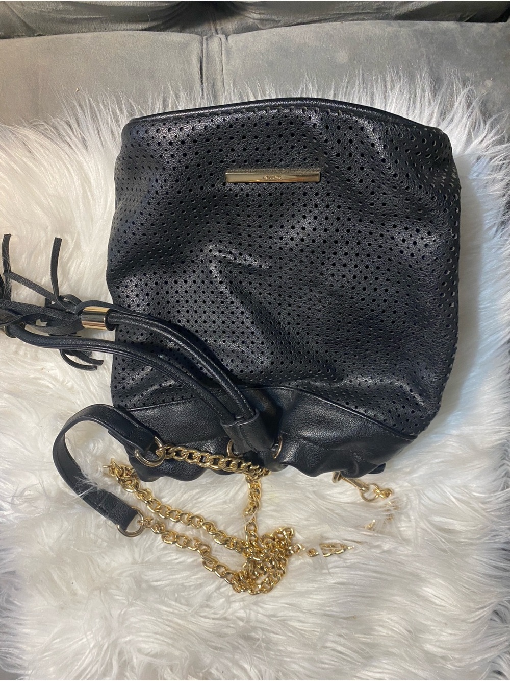 Kensie Black Perforated Drawstring Shoulder Bag with Gold Chain